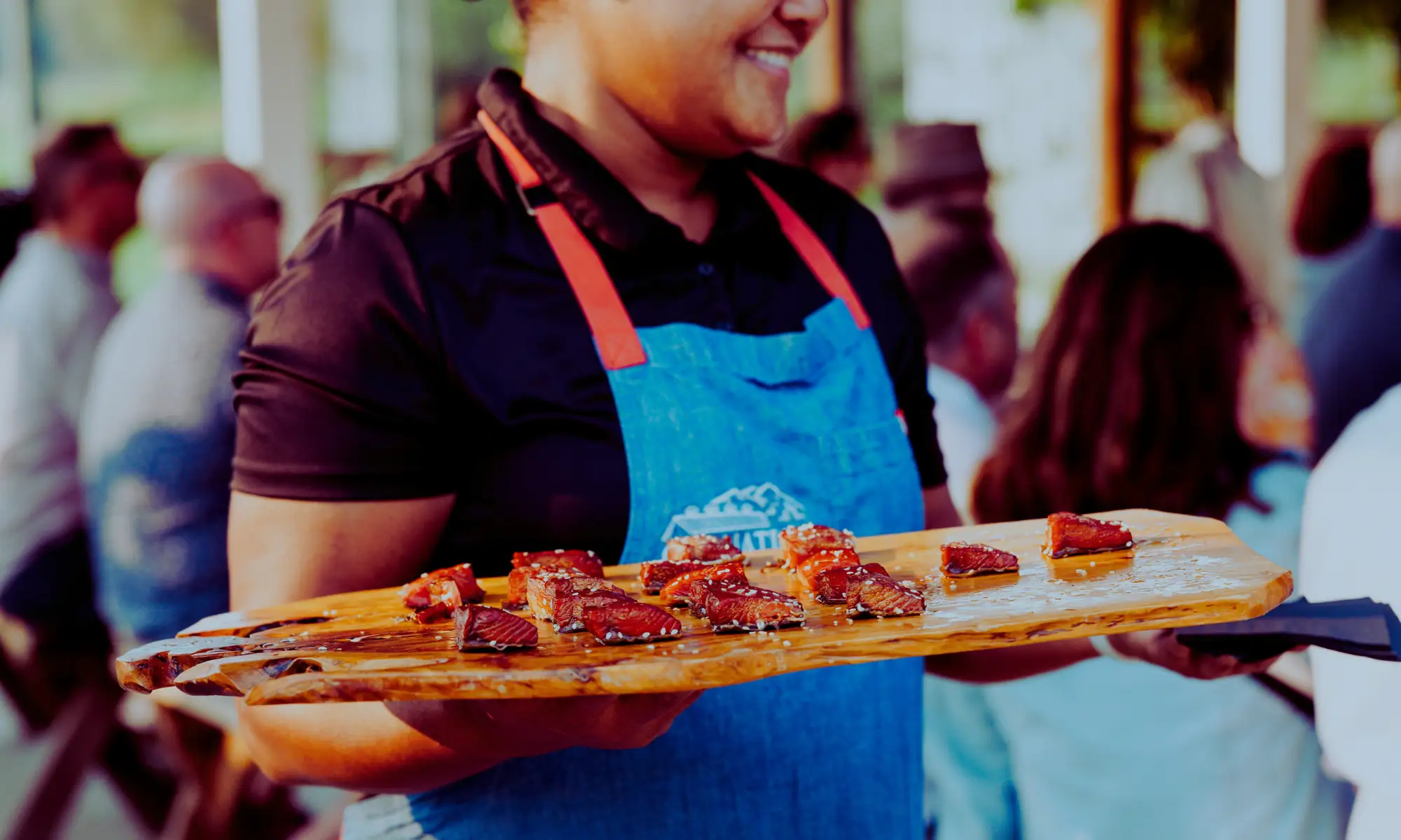 Chef serving seasonal farm-to-table appetizers at Carnation Farms